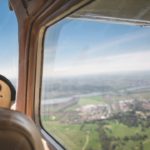 Beige Aircraft Cockpit Green Fields background image & Google Slides Theme