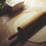 Beige Rolling Pin and Dough background image & Google Slides Theme