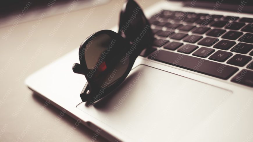 Black Sunglasses Silver Laptop background image