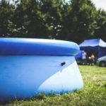 Blue InflatablePool GreenGrass background image & Google Slides Theme