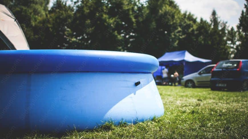 Blue InflatablePool GreenGrass background image