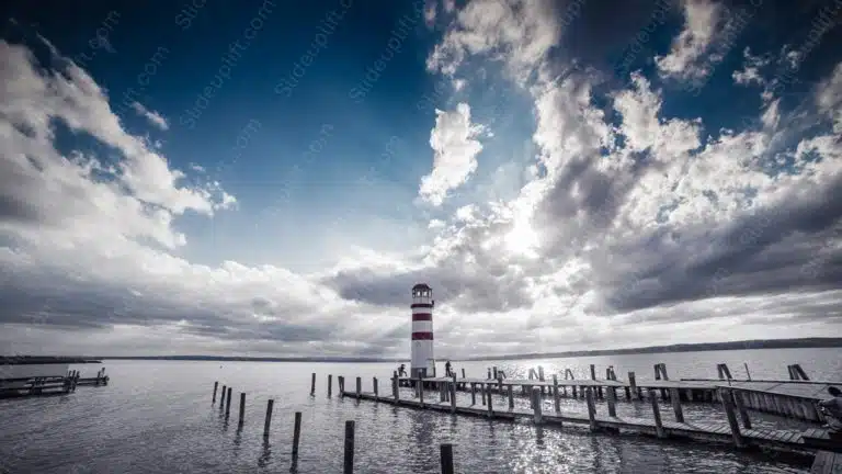 Blue Sky Grey Clouds Red White Lighthouse Wooden Pier Water background image & Google Slides Theme