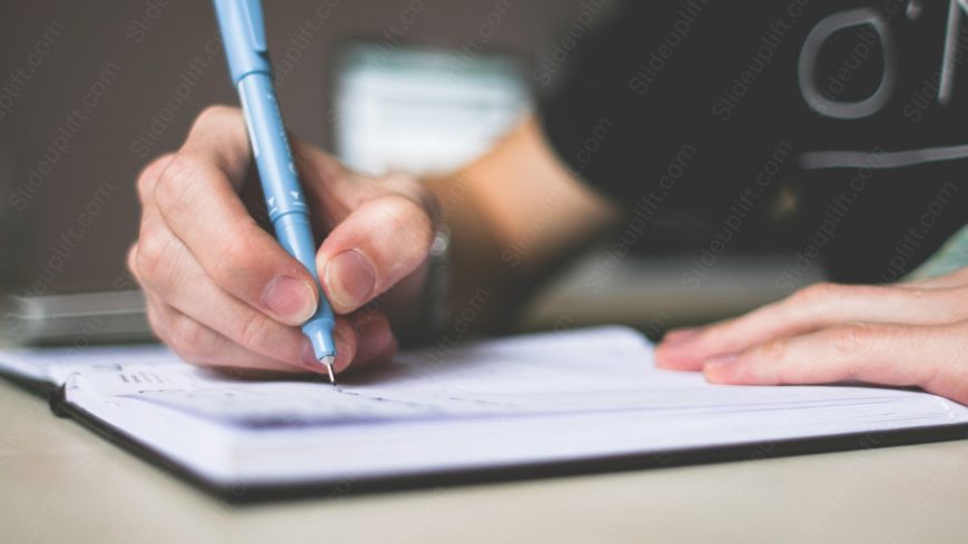 Blue pen writing on white notebook background image