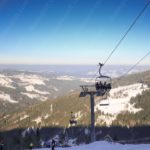 Blue sky white snow green trees ski lift background image & Google Slides Theme