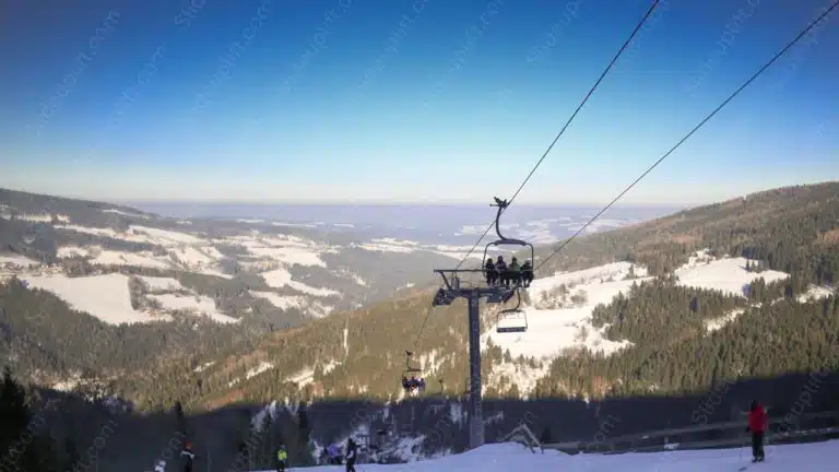 Blue sky white snow green trees ski lift background image & Google Slides Theme