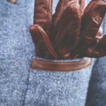 Brown Gloves Blue Coat background image & Google Slides Theme