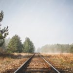 Brown Green Railroad Tracks Forest Mist background image & Google Slides Theme