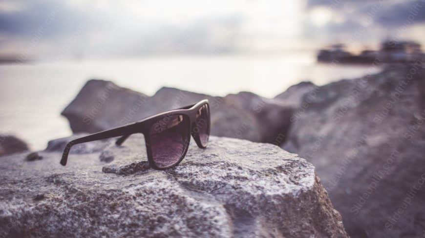 Brown Sunglasses Seaside background image