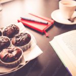 Brown muffins red book white cup background image & Google Slides Theme