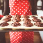 Chocolate Brown Muffins Red Polka Dot Dress background image & Google Slides Theme