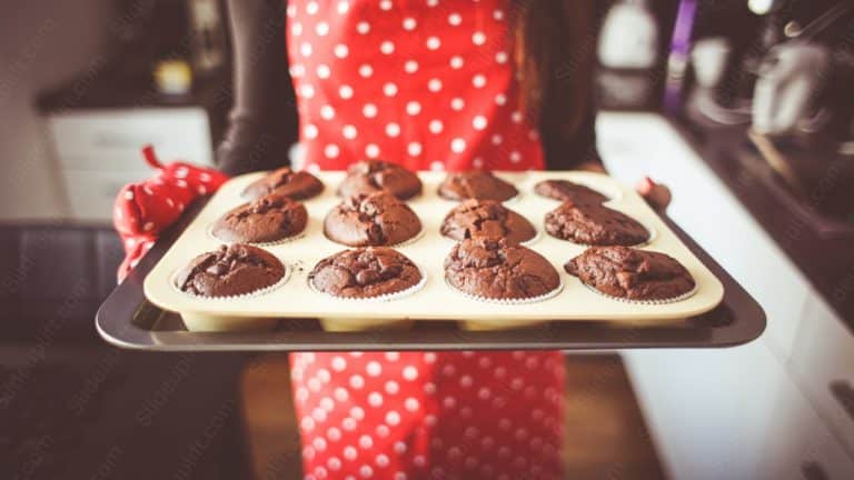 Chocolate Brown Muffins Red Polka Dot Dress background image & Google Slides Theme