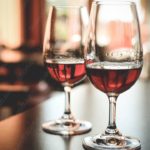 Crimson Wine Glasses Warm background image & Google Slides Theme