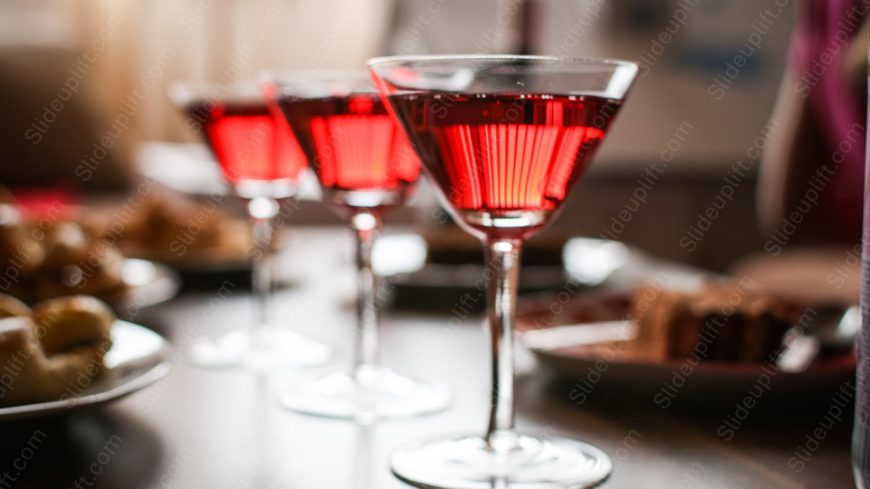 Crimson cocktail glasses dining background image