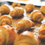 Golden Brown Croissants Warm background image & Google Slides Theme