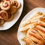 Golden Pastry Twists and Rolls Wooden Table background image & Google Slides Theme