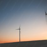 Gradient sunset wind turbines background image & Google Slides Theme