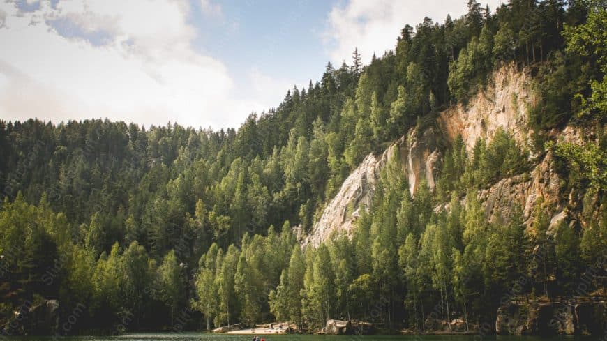 Green Forest Blue Lake Beige Cliff background image