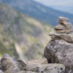 Grey Rock Cairn Mountainous background image & Google Slides Theme