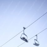 Pale Blue Ski Lift Chairs background image & Google Slides Theme