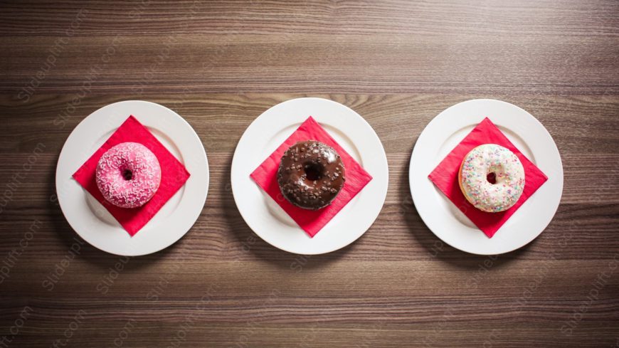 Pink Chocolate White Doughnuts on Red Napkins Wooden Table background image