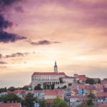 Purple Orange Sky Castle Town background image & Google Slides Theme