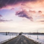 Purple Orange Sky Road Snowy Field background image & Google Slides Theme