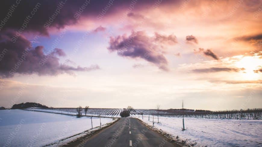 Purple Orange Sky Road Snowy Field background image