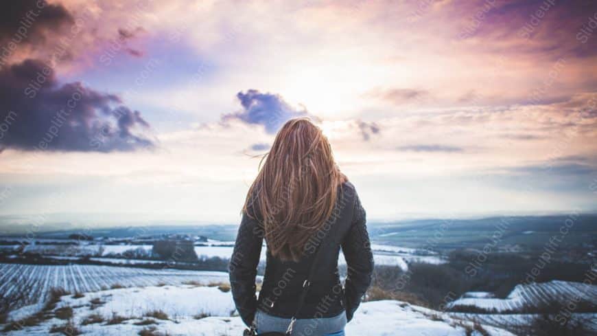 Purple Orange Sky Woman Snowy Field background image