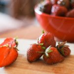 Red Strawberries Wooden Background Image & Google Slides Theme