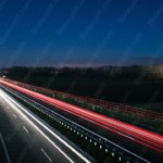 Red White Light Streaks Highway Night Sky background image & Google Slides Theme