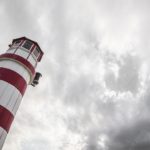 Red White Lighthouse Stormy Sky background image & Google Slides Theme
