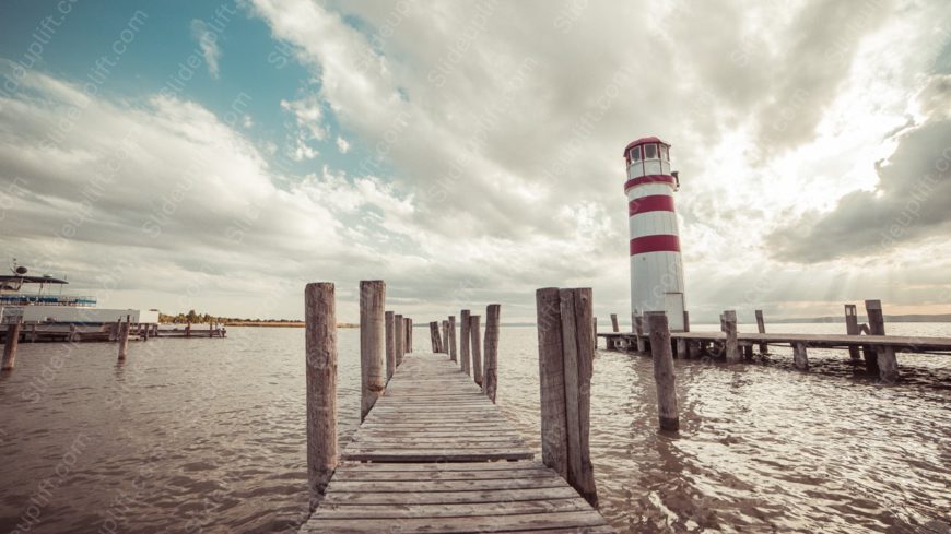 Red White Lighthouse Wooden Pier Water background image