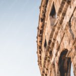 Sandstone Colosseum Airplane Sky background image & Google Slides Theme