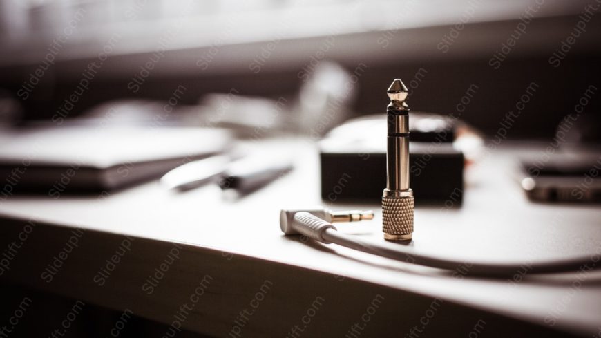 Silver Audio Jack Work Desk background image