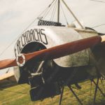 Silver Biplane Background Image & Google Slides Theme