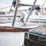 Silver Boat Railing Brown Wood & Blue Rope Marina background image & Google Slides Theme