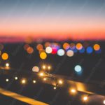 Twilight Orange Lights Bokeh background image & Google Slides Theme