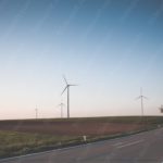 Twilight blue wind turbines countryside road background image & Google Slides Theme