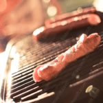 Warm amber sausage grill background image & Google Slides Theme