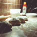 Warm brown rolling pin dough loaves kitchen counter background image & Google Slides Theme