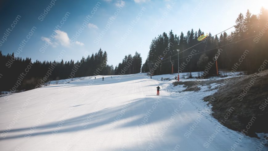 White Snow Skiers Blue Sky background image