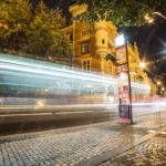 White Yellow LightStreaks BrownBuilding Streetlamp NightSky background image & Google Slides Theme