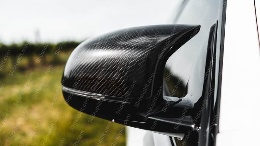 Black Car Side Mirror Green and White background image