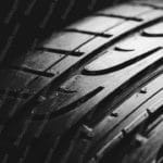 Black Gray TireTread background image & Google Slides Theme