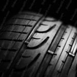 Black Grey Tire Tread background image & Google Slides Theme