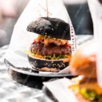 Black brown yellow burger bokeh background image & Google Slides Theme