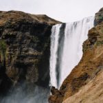 Brown Green Waterfall background image & Google Slides Theme