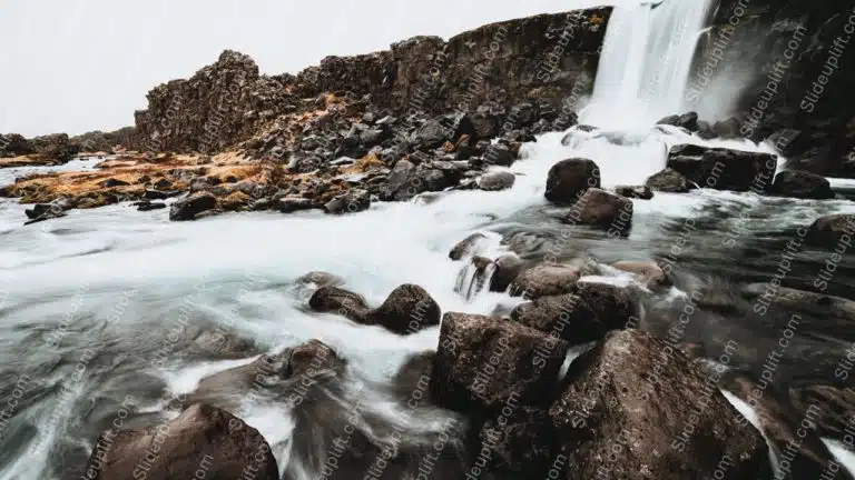 Brown Rocks Waterfall background image & Google Slides Theme