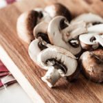 Brown White Mushrooms Wooden Board background image & Google Slides Theme