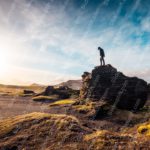 Golden Silhouette on Black Rocks background image & Google Slides Theme